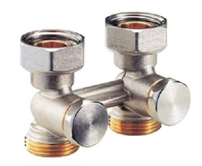 Узел нижнего подключения стальных панельных радиаторов 3/4'Fx3/4'E, прямой, для двухтрубных систем. Содержит отсечной клапан для перекрытия и балансировки.